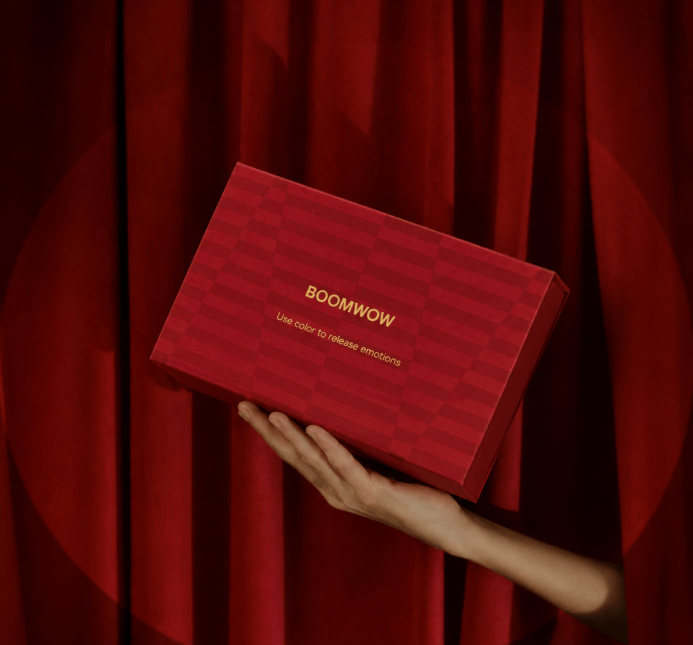Red Confetti Popper in a vivid red scene